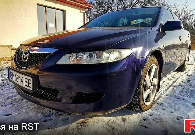 Синий Мазда 6, объемом двигателя 2 л и пробегом 270 тыс. км за 3900 $, фото 1 на Automoto.ua