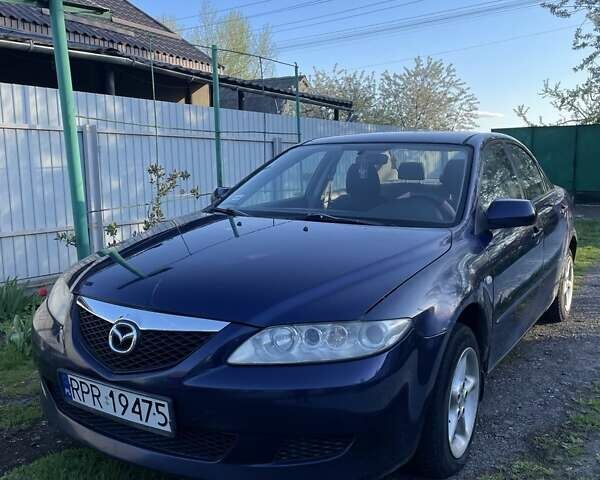 Синий Мазда 6, объемом двигателя 2 л и пробегом 367 тыс. км за 1800 $, фото 1 на Automoto.ua