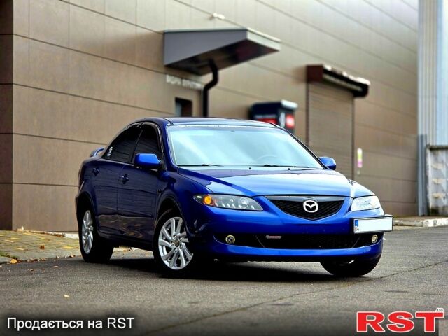 Синий Мазда 6, объемом двигателя 2 л и пробегом 307 тыс. км за 5500 $, фото 1 на Automoto.ua