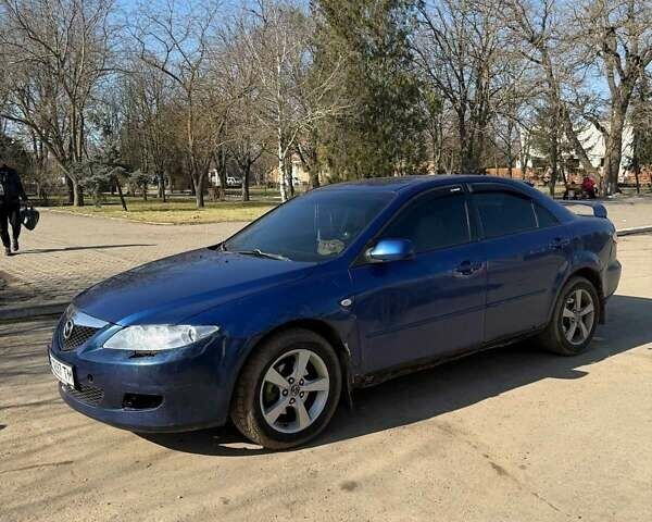 Синий Мазда 6, объемом двигателя 2 л и пробегом 357 тыс. км за 3015 $, фото 1 на Automoto.ua