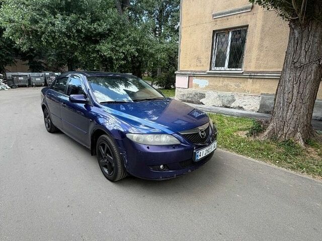 Синий Мазда 6, объемом двигателя 2 л и пробегом 300 тыс. км за 2100 $, фото 1 на Automoto.ua