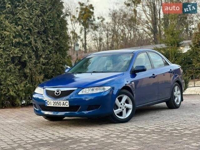 Синій Мазда 6, об'ємом двигуна 2 л та пробігом 268 тис. км за 2750 $, фото 1 на Automoto.ua