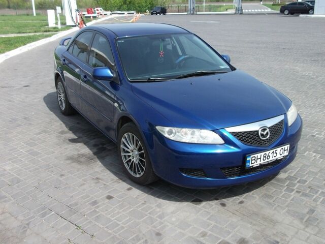 Синий Мазда 6, объемом двигателя 2 л и пробегом 255 тыс. км за 3910 $, фото 1 на Automoto.ua