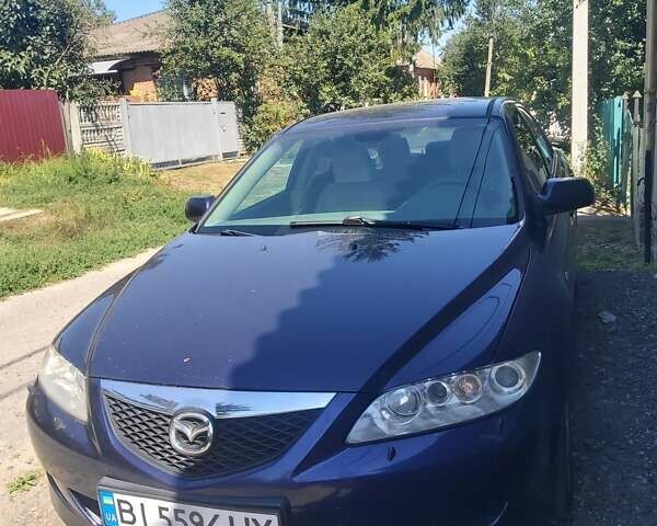 Синий Мазда 6, объемом двигателя 2 л и пробегом 275 тыс. км за 4000 $, фото 1 на Automoto.ua