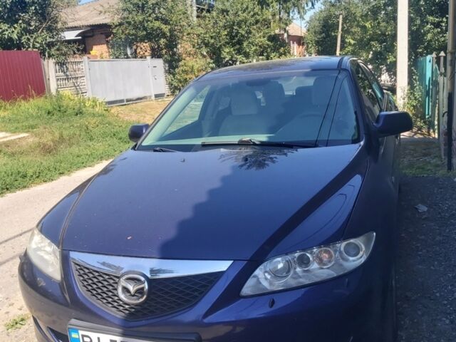 Синий Мазда 6, объемом двигателя 2 л и пробегом 275 тыс. км за 4000 $, фото 1 на Automoto.ua