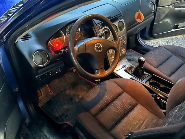 Синій Мазда 6, об'ємом двигуна 2 л та пробігом 333 тис. км за 2400 $, фото 1 на Automoto.ua