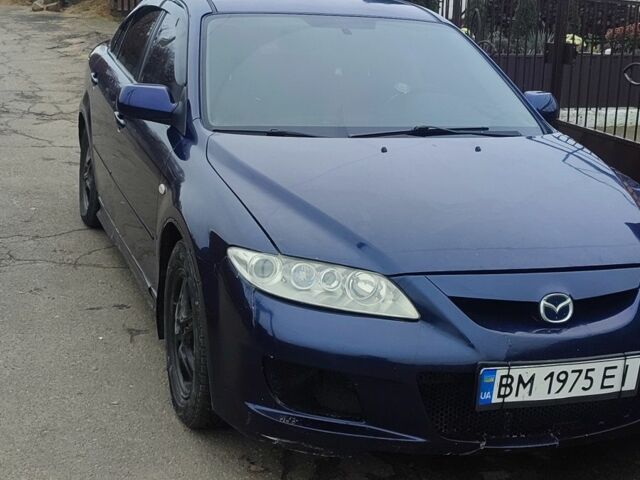Синий Мазда 6, объемом двигателя 2 л и пробегом 300 тыс. км за 3000 $, фото 1 на Automoto.ua