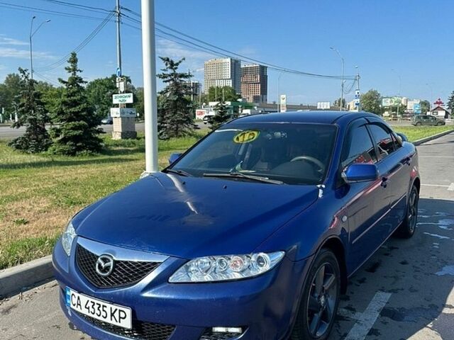 Синий Мазда 6, объемом двигателя 2 л и пробегом 376 тыс. км за 3300 $, фото 1 на Automoto.ua