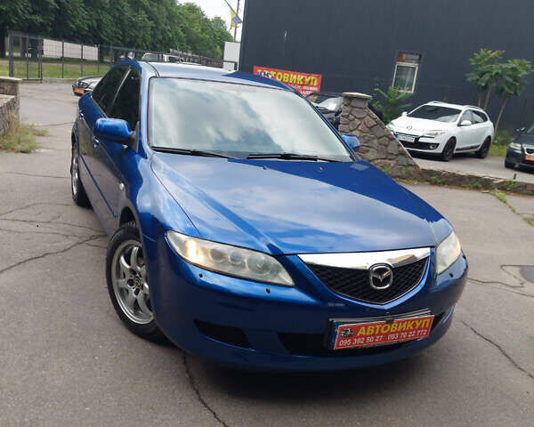 Синий Мазда 6, объемом двигателя 1.8 л и пробегом 168 тыс. км за 4500 $, фото 1 на Automoto.ua