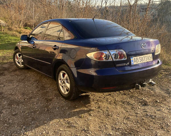 Синий Мазда 6, объемом двигателя 1.8 л и пробегом 321 тыс. км за 3950 $, фото 1 на Automoto.ua
