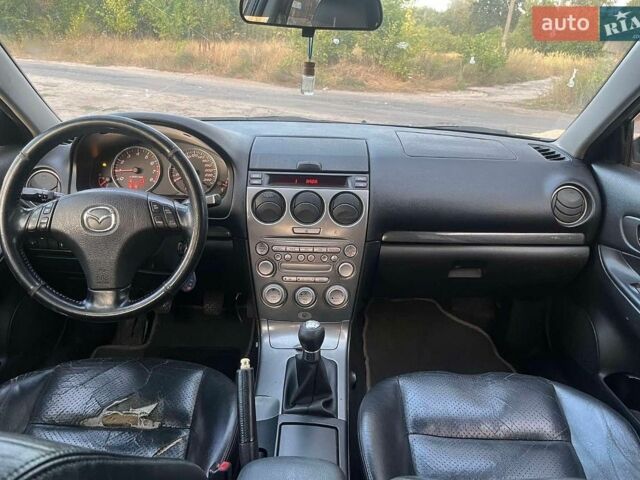 Синий Мазда 6, объемом двигателя 2 л и пробегом 250 тыс. км за 2200 $, фото 1 на Automoto.ua