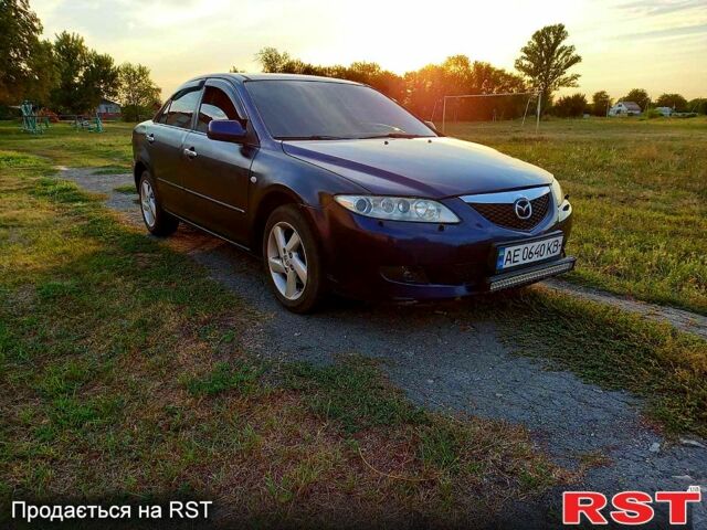 Синий Мазда 6, объемом двигателя 1.8 л и пробегом 240 тыс. км за 3800 $, фото 1 на Automoto.ua