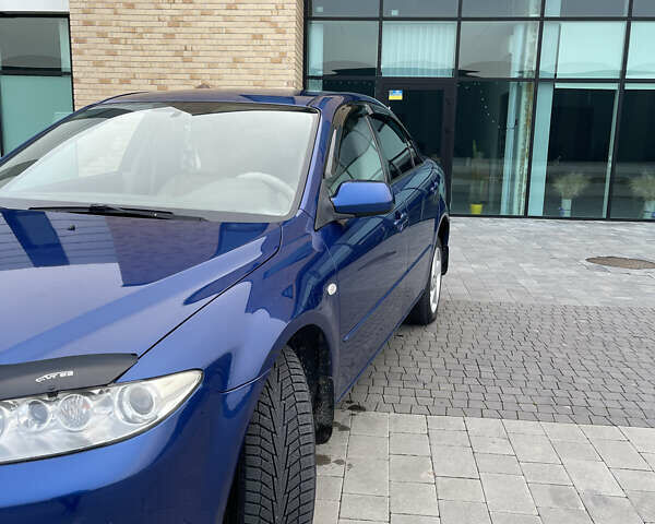 Синий Мазда 6, объемом двигателя 2 л и пробегом 260 тыс. км за 5100 $, фото 1 на Automoto.ua