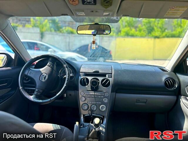 Синій Мазда 6, об'ємом двигуна 2 л та пробігом 211 тис. км за 3100 $, фото 1 на Automoto.ua