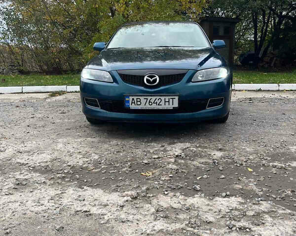 Синий Мазда 6, объемом двигателя 1.8 л и пробегом 354 тыс. км за 4100 $, фото 1 на Automoto.ua