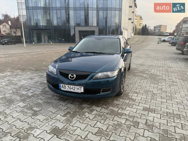 Синий Мазда 6, объемом двигателя 1.8 л и пробегом 355 тыс. км за 4500 $, фото 1 на Automoto.ua