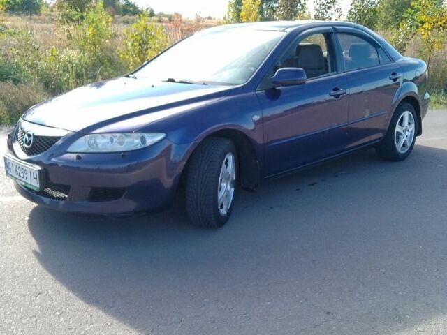 Синий Мазда 6, объемом двигателя 2 л и пробегом 217 тыс. км за 4700 $, фото 1 на Automoto.ua