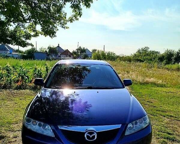 Синій Мазда 6, об'ємом двигуна 2 л та пробігом 295 тис. км за 4500 $, фото 1 на Automoto.ua