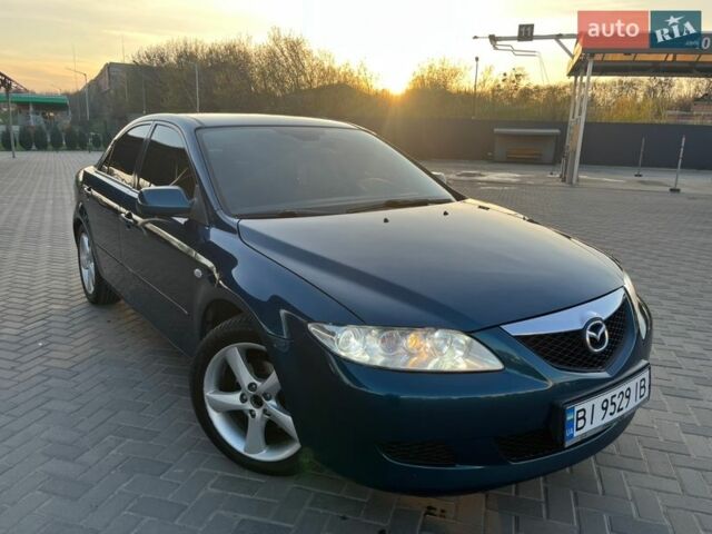Синий Мазда 6, объемом двигателя 2 л и пробегом 225 тыс. км за 6500 $, фото 1 на Automoto.ua