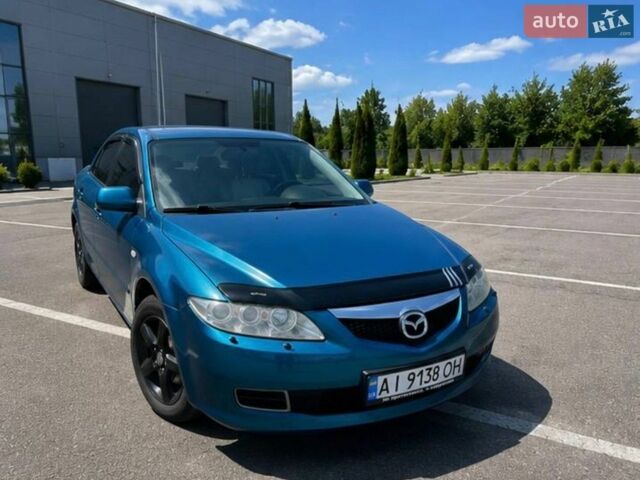 Синий Мазда 6, объемом двигателя 2 л и пробегом 380 тыс. км за 4400 $, фото 1 на Automoto.ua