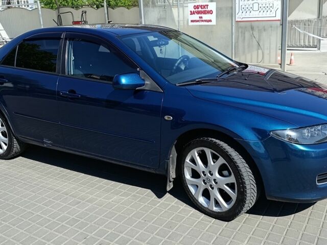Синий Мазда 6, объемом двигателя 1.8 л и пробегом 170 тыс. км за 5600 $, фото 1 на Automoto.ua