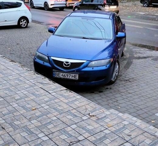 Синий Мазда 6, объемом двигателя 2 л и пробегом 300 тыс. км за 3500 $, фото 1 на Automoto.ua