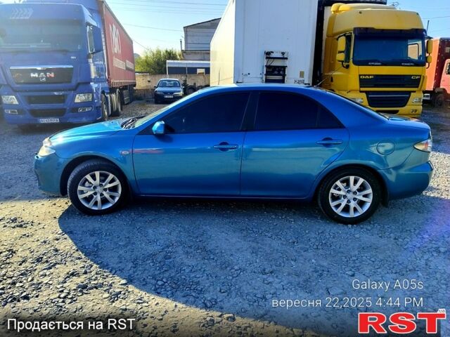 Синій Мазда 6, об'ємом двигуна 2 л та пробігом 385 тис. км за 4500 $, фото 1 на Automoto.ua