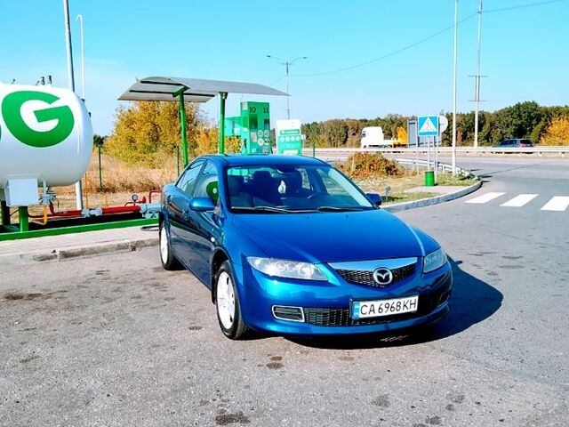 Синий Мазда 6, объемом двигателя 1.8 л и пробегом 292 тыс. км за 5000 $, фото 1 на Automoto.ua