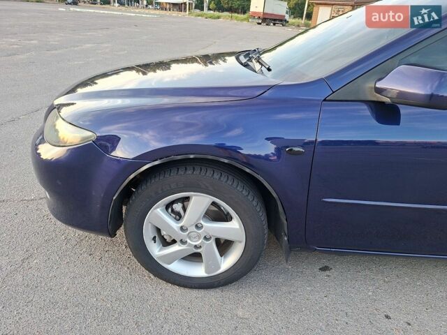 Синий Мазда 6, объемом двигателя 2 л и пробегом 256 тыс. км за 3800 $, фото 1 на Automoto.ua
