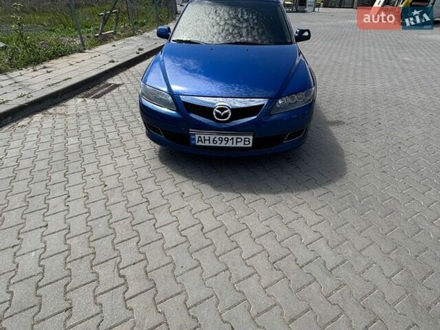 Синий Мазда 6, объемом двигателя 2 л и пробегом 270 тыс. км за 4600 $, фото 1 на Automoto.ua
