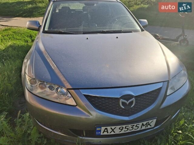 Синій Мазда 6, об'ємом двигуна 1.8 л та пробігом 252 тис. км за 3500 $, фото 1 на Automoto.ua