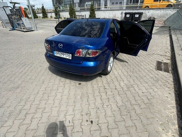 Синий Мазда 6, объемом двигателя 2 л и пробегом 270 тыс. км за 4150 $, фото 1 на Automoto.ua