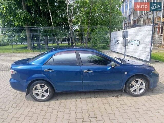 Синій Мазда 6, об'ємом двигуна 1.8 л та пробігом 244 тис. км за 4500 $, фото 1 на Automoto.ua