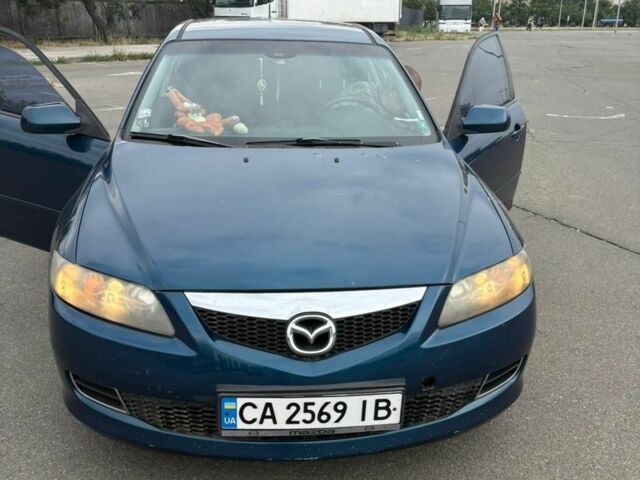 Синий Мазда 6, объемом двигателя 2 л и пробегом 300 тыс. км за 5300 $, фото 1 на Automoto.ua