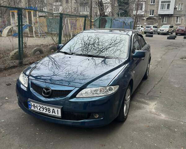Синий Мазда 6, объемом двигателя 2 л и пробегом 225 тыс. км за 5500 $, фото 1 на Automoto.ua