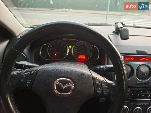 Синий Мазда 6, объемом двигателя 2 л и пробегом 205 тыс. км за 4500 $, фото 1 на Automoto.ua