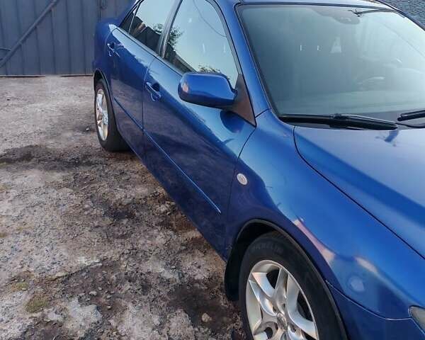 Синий Мазда 6, объемом двигателя 2 л и пробегом 320 тыс. км за 4400 $, фото 1 на Automoto.ua