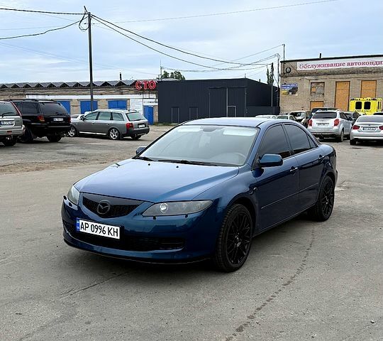Синий Мазда 6, объемом двигателя 2 л и пробегом 185 тыс. км за 6000 $, фото 1 на Automoto.ua