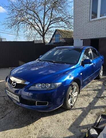 Синій Мазда 6, об'ємом двигуна 1.8 л та пробігом 235 тис. км за 4500 $, фото 1 на Automoto.ua