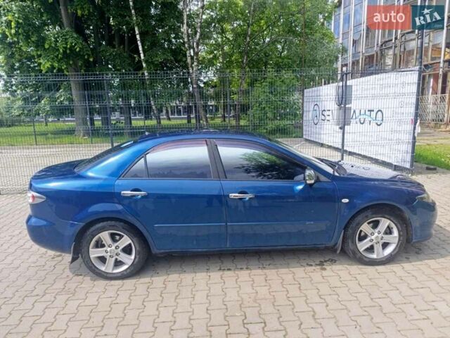 Синій Мазда 6, об'ємом двигуна 1.8 л та пробігом 244 тис. км за 5250 $, фото 1 на Automoto.ua