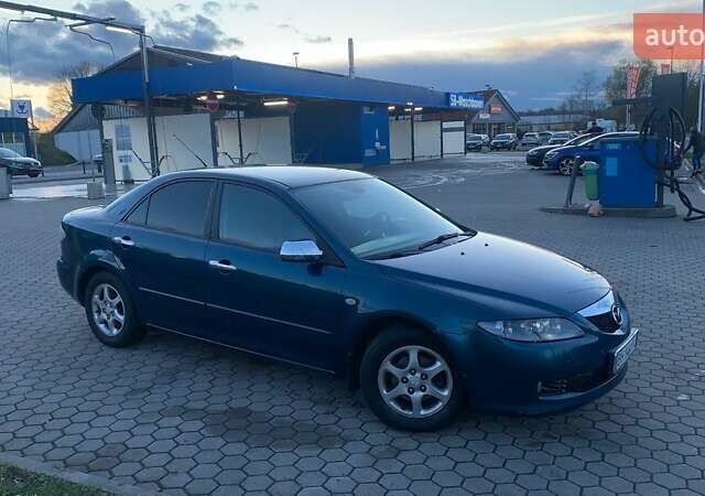 Синій Мазда 6, об'ємом двигуна 1.8 л та пробігом 258 тис. км за 4100 $, фото 1 на Automoto.ua