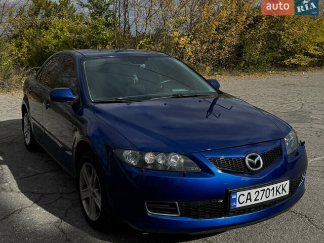Синий Мазда 6, объемом двигателя 2 л и пробегом 184 тыс. км за 6299 $, фото 1 на Automoto.ua