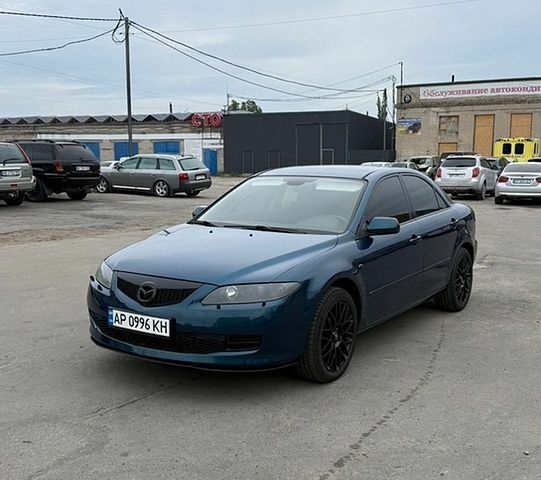 Синий Мазда 6, объемом двигателя 2 л и пробегом 185 тыс. км за 6000 $, фото 1 на Automoto.ua