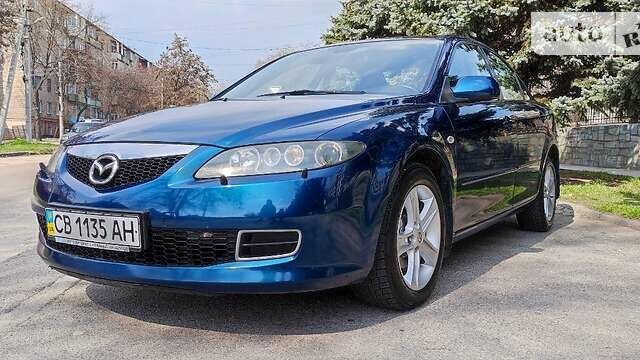 Синий Мазда 6, объемом двигателя 2 л и пробегом 244 тыс. км за 6300 $, фото 1 на Automoto.ua