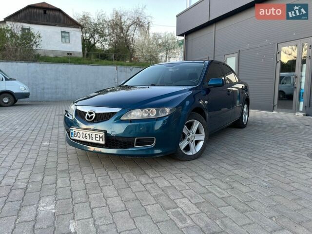 Синий Мазда 6, объемом двигателя 2 л и пробегом 253 тыс. км за 4199 $, фото 1 на Automoto.ua