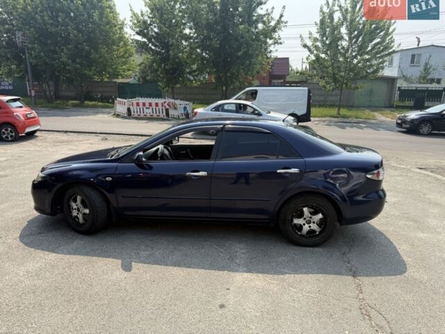 Синий Мазда 6, объемом двигателя 2 л и пробегом 348 тыс. км за 3200 $, фото 1 на Automoto.ua