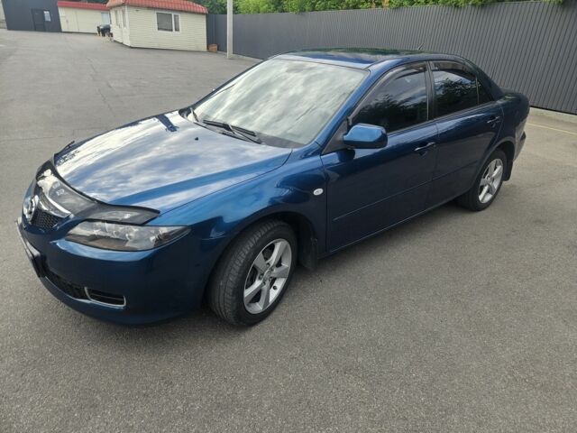 Синий Мазда 6, объемом двигателя 1.8 л и пробегом 211 тыс. км за 6050 $, фото 1 на Automoto.ua