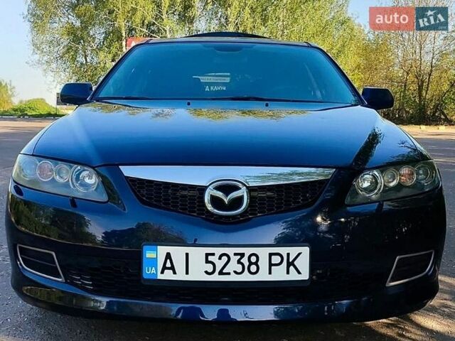 Синий Мазда 6, объемом двигателя 2 л и пробегом 245 тыс. км за 5300 $, фото 1 на Automoto.ua