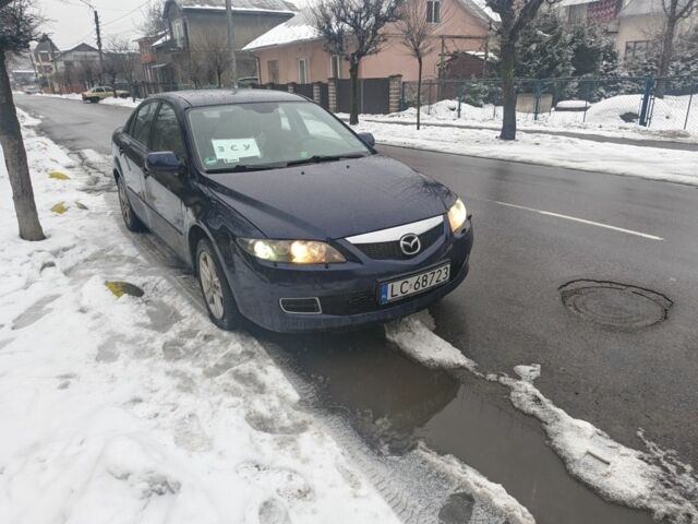 Синий Мазда 6, объемом двигателя 2 л и пробегом 247 тыс. км за 2500 $, фото 1 на Automoto.ua