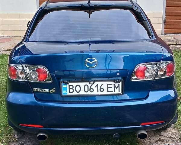Синий Мазда 6, объемом двигателя 2 л и пробегом 253 тыс. км за 5300 $, фото 1 на Automoto.ua